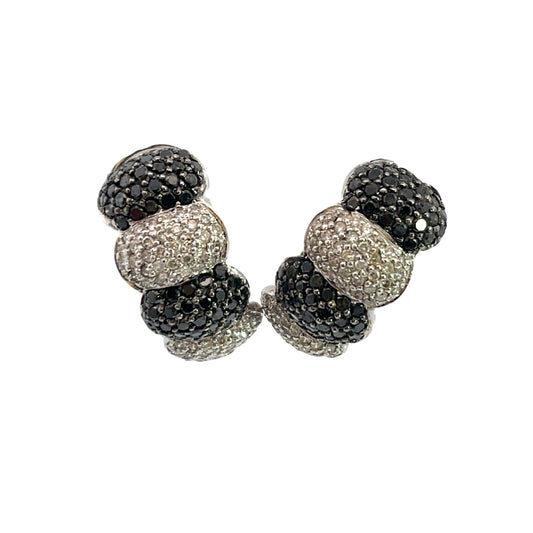 Modern 14K white gold black and white diamond pave half hoop omega earrings