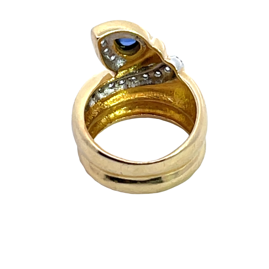 Modern 14K yellow and white gold diamond and sapphire snake ring