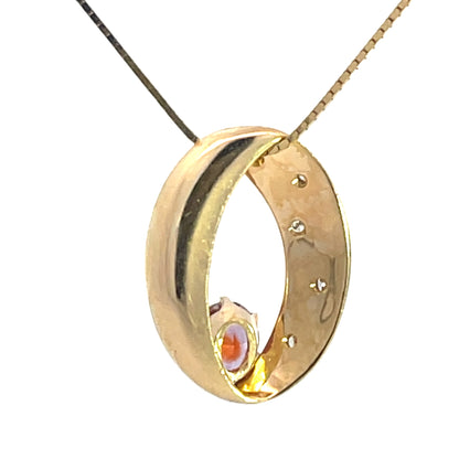 Modern 14KY gold Montana padparadscha sapphire with diamond pendant