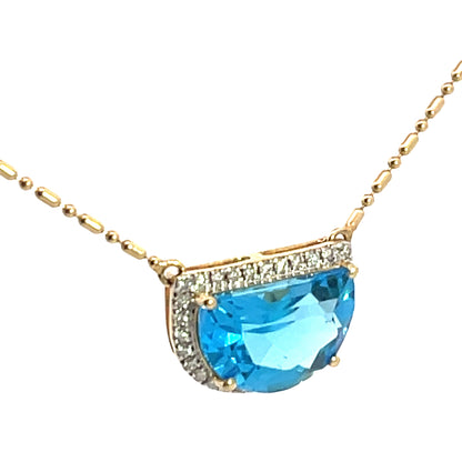 Modern 18KY gold, diamond and blue topaz pendant with chain