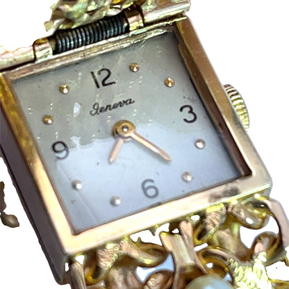 Modern 14KY gold and diamond peek-a-boo bracelet watch