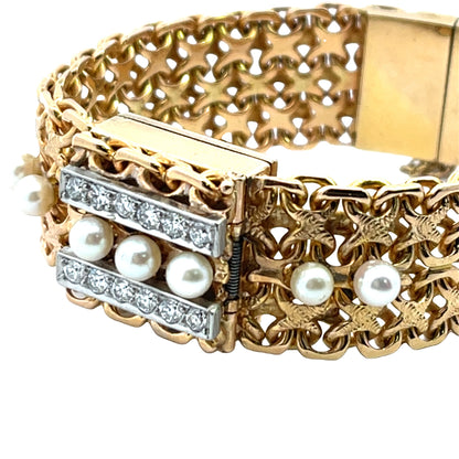 Modern 14KY gold and diamond peek-a-boo bracelet watch