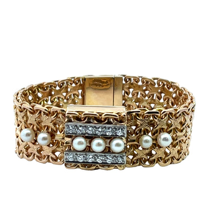 Modern 14KY gold and diamond peek-a-boo bracelet watch