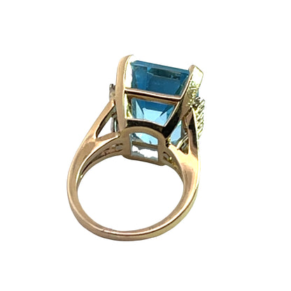 Modern 14KY gold, Blue Topaz and diamond ring
