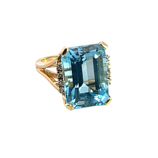 Modern 14KY gold, Blue Topaz and diamond ring