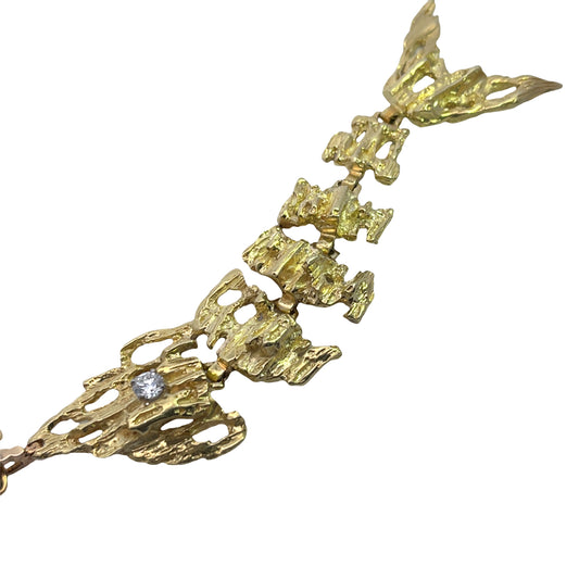 Modern 18KY gold and diamond Brutalist articulated fish pendant