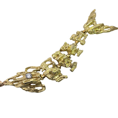 Modern 18KY gold and diamond Brutalist articulated fish pendant