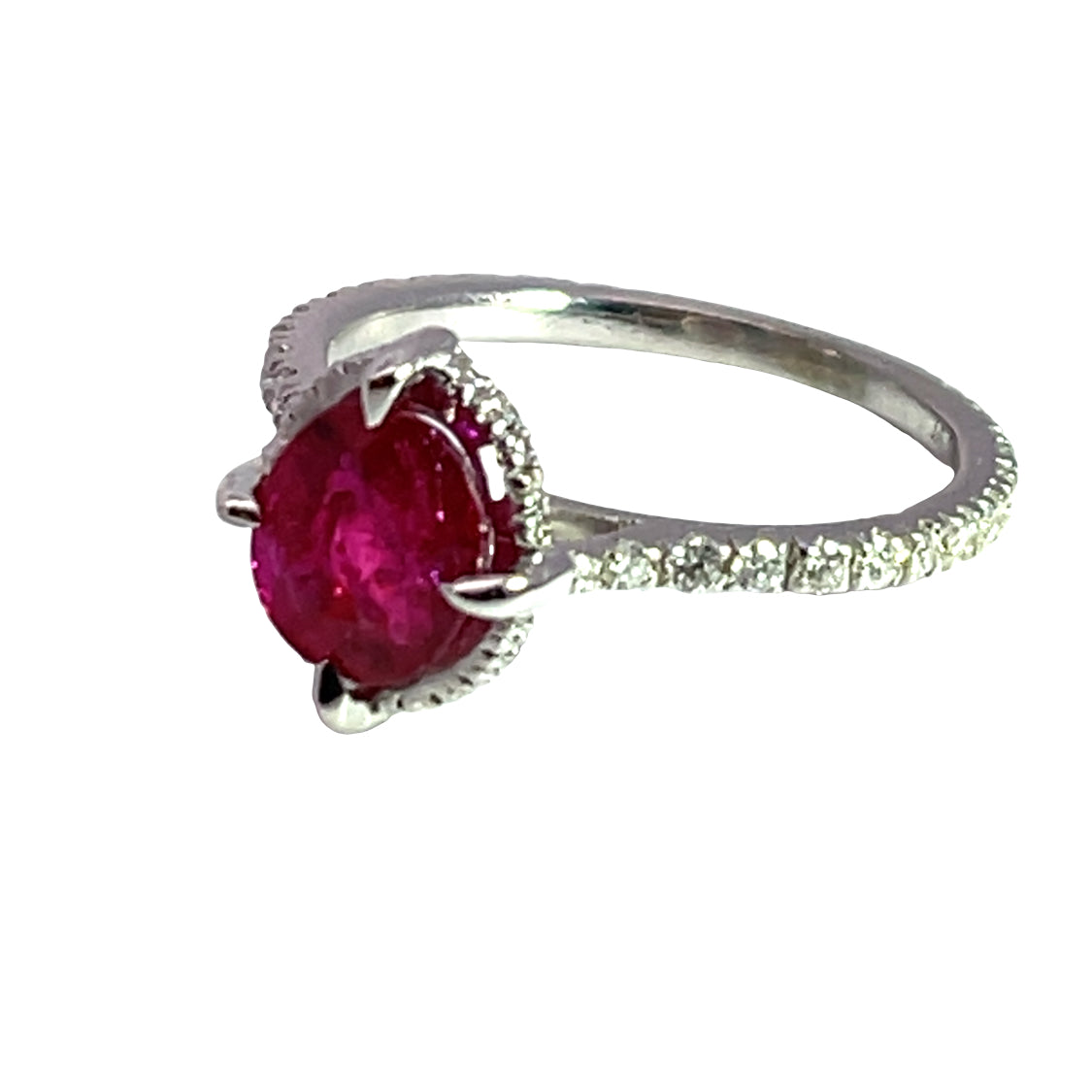 Modern 18K white gold, Burmese ruby, and diamond halo ring