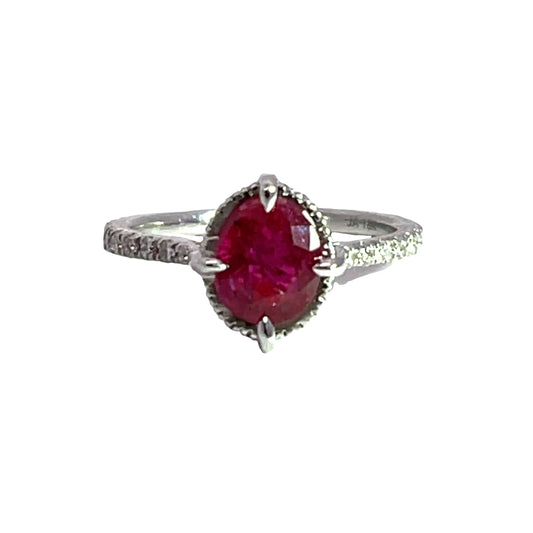 Modern 18K white gold, Burmese ruby, and diamond halo ring