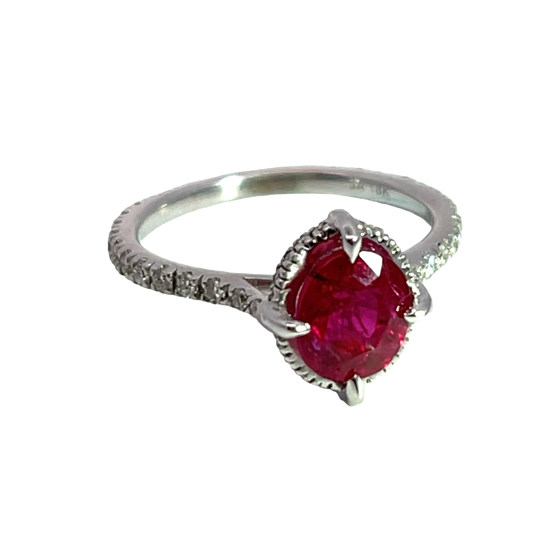 Modern 18K white gold, Burmese ruby, and diamond halo ring