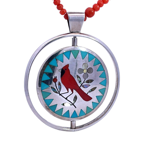 Native American Sterling silver coral, mother of pearl onyx and turquoise inlay spinner pendant
