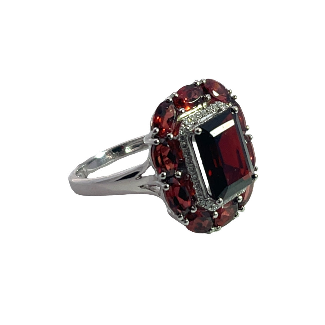 Modern Platinum, diamond and garnet halo ring