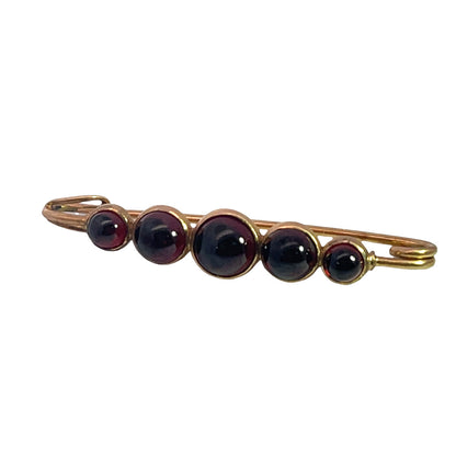 Victorian 10KY gold, and garnet cabochon collar pin