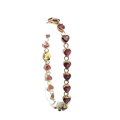 Modern 14KY gold and heart shaped garnet link tennis bracelet