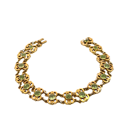 Art Noveau 14KY gold and peridot articulated link bracelet