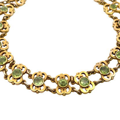 Art Noveau 14KY gold and peridot articulated link bracelet