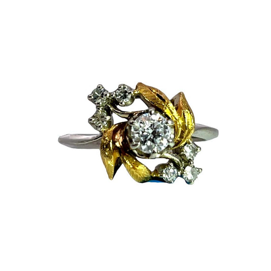 Modern 14K white and yellow gold and diamond ring