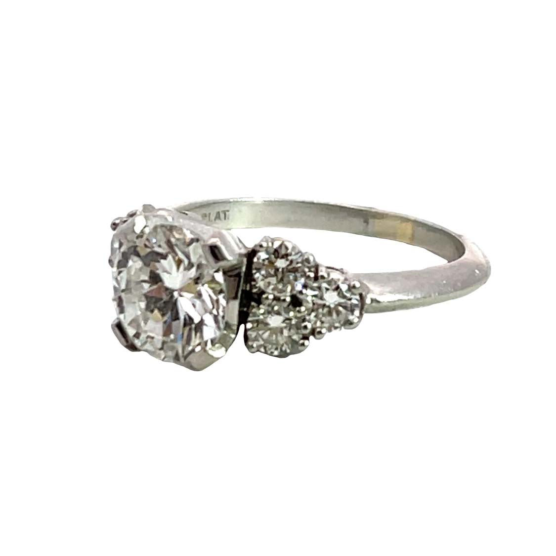 Modern platinum and natural diamond ring
