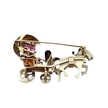 Mid Century Modern 18KYellow and white gold with moonstones, sapphires and rubies, carriage brooch