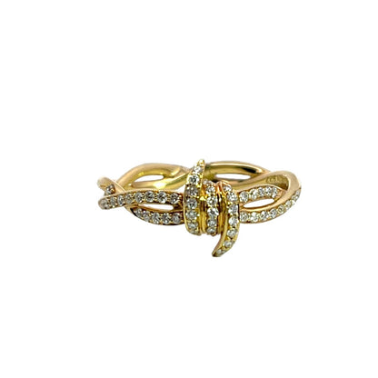Modern 18KY gold and diamond 'Forget Me Knot' ring